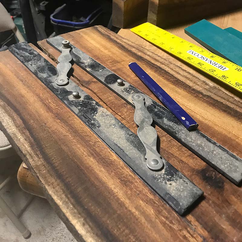 using a parallel ruer and pencil to mark saw cut to create live edge magnetic knife strips and live edge wood coasters from salvaged hardwood lumber