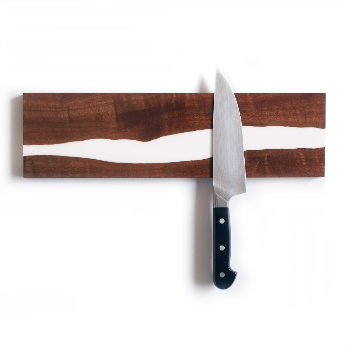 magnetic knife holder made with salvaged live edge hardwood and white epoxy resin