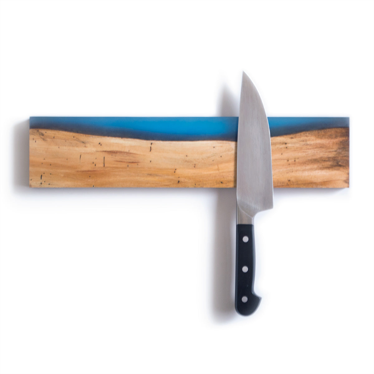 wood and epoxy magnetic knife holder made from salvaged mahogany wood and frosted blue epoxy resin