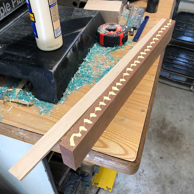 https://knife-en-place.com/cdn/shop/products/gluing-reclaimed-ipe-and-maple-strips-to-create-hardwood-real-wood-knife-rack_1200x.jpg?v=1627537816
