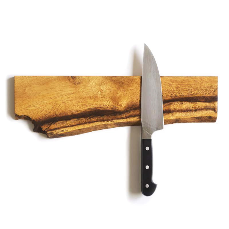 live edge knife holder made with locally salvaged albizia wood with a knife