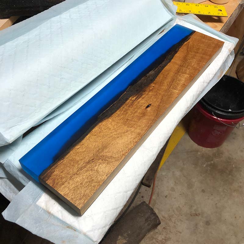 epoxy resin magnetic knife holder made with sweet acacia hardwood live edge lumber and blue epoxy resin