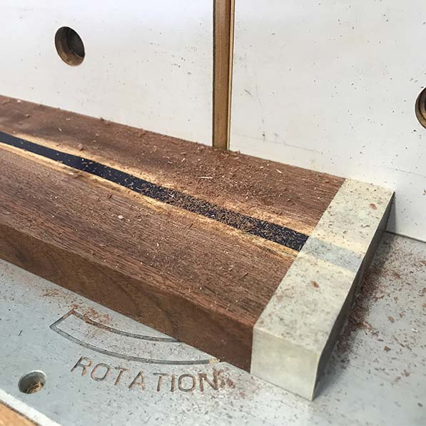 handmaking a magnetic knife holder by routing channels for magnets in a live edge walnut and epoxy resin knife bar