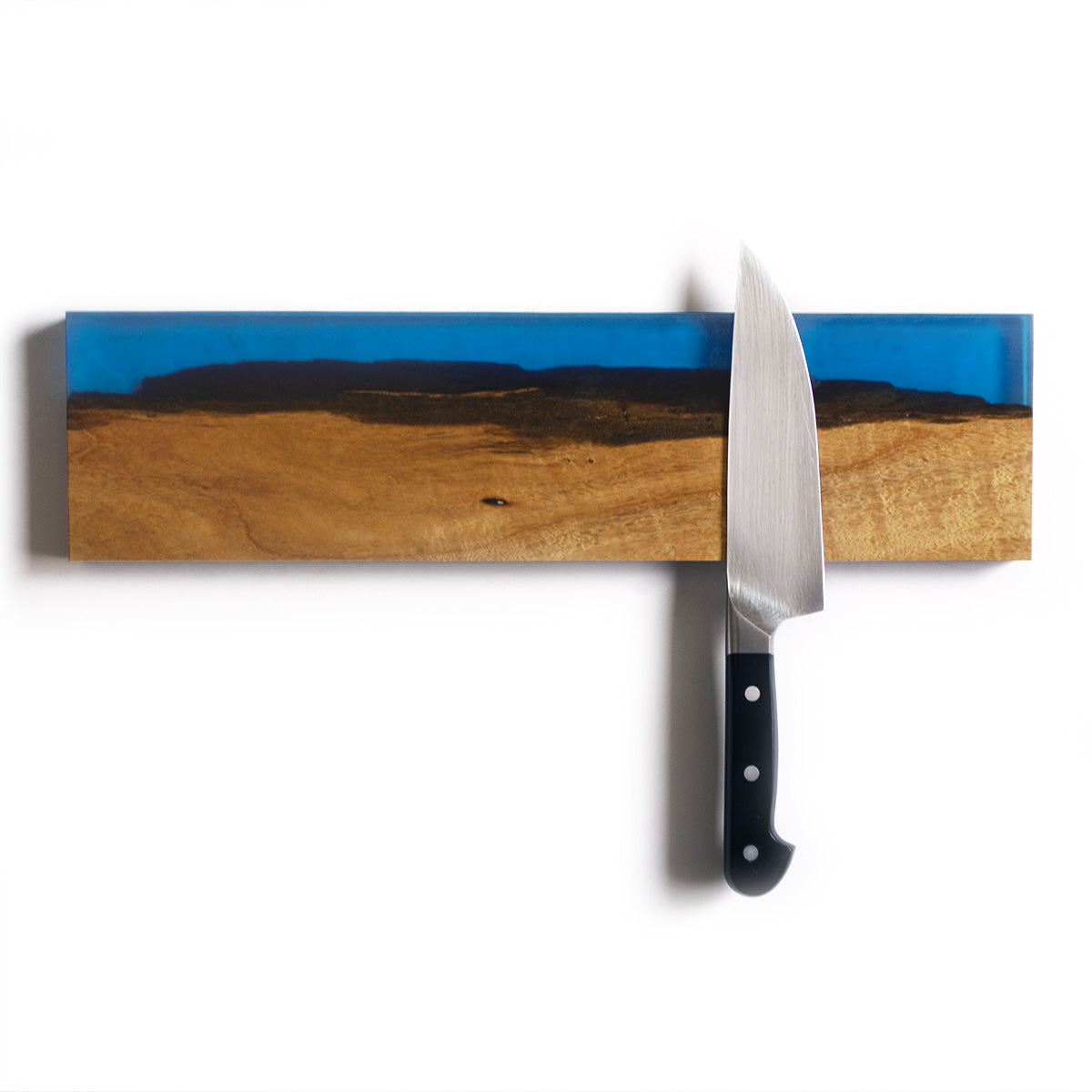 magnetic knife holder made with salvaged live edge acacia hardwood and translucent sjy blue epoxy resin