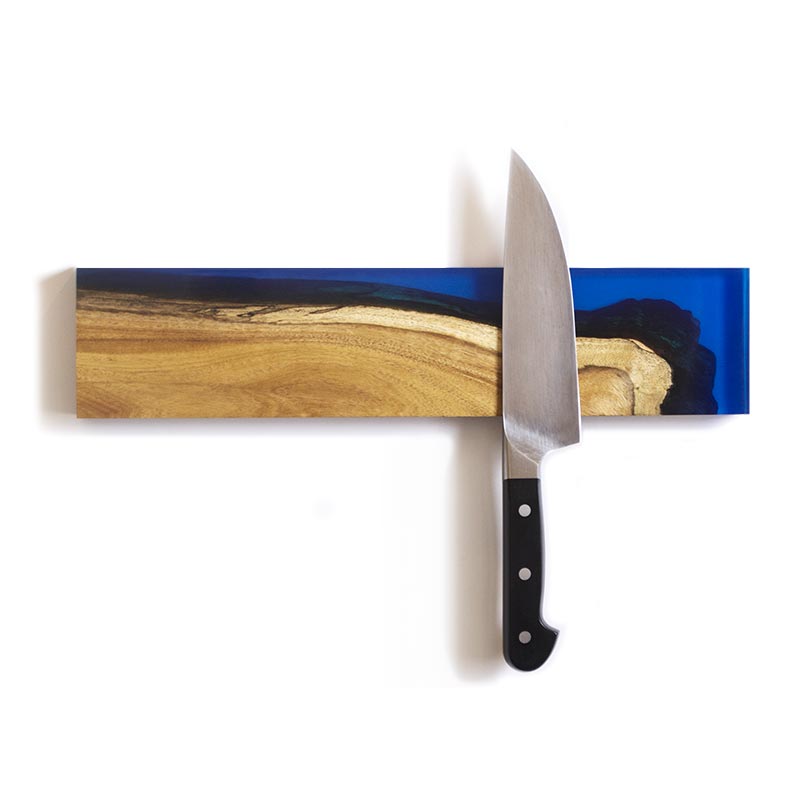magnetic knife holder handcrafted from salvaged live edge acacia wood and transparent sapphire blue epoxy resin