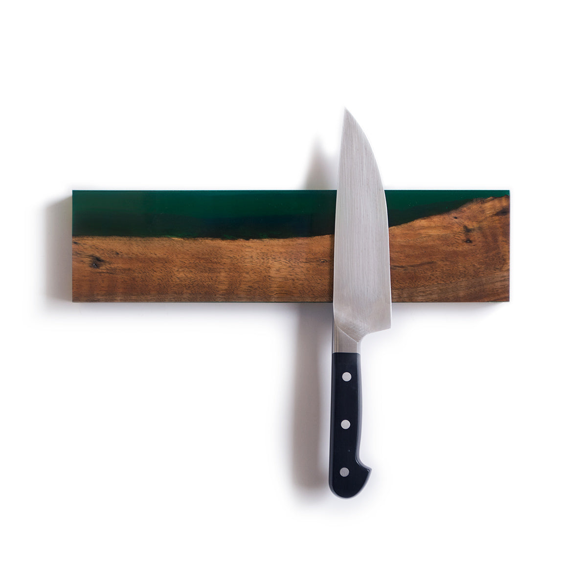 wooden magnetic knife holder made from salvaged live edge walnut wood and translucent green epoxy resin