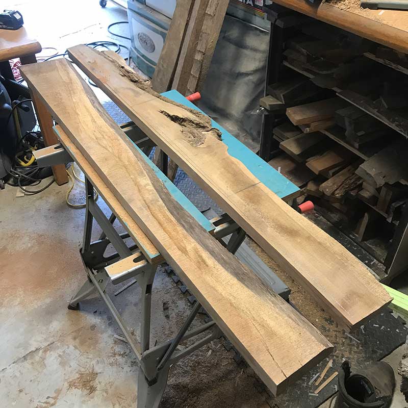 two boards of live edge sweet acacia wood salvaged in south Florida